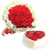 Bunch of 100 Red Roses with Seasonal Fillers along with 1 Kg (2.2 Lbs) Heart Shaped Pineapple Cake